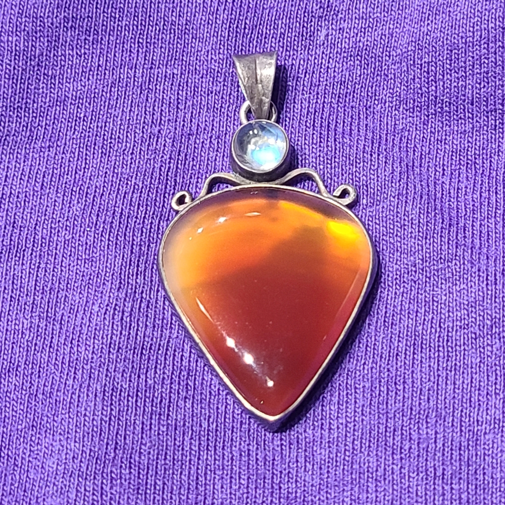 Elegant Silver and Orange Pendant Necklace